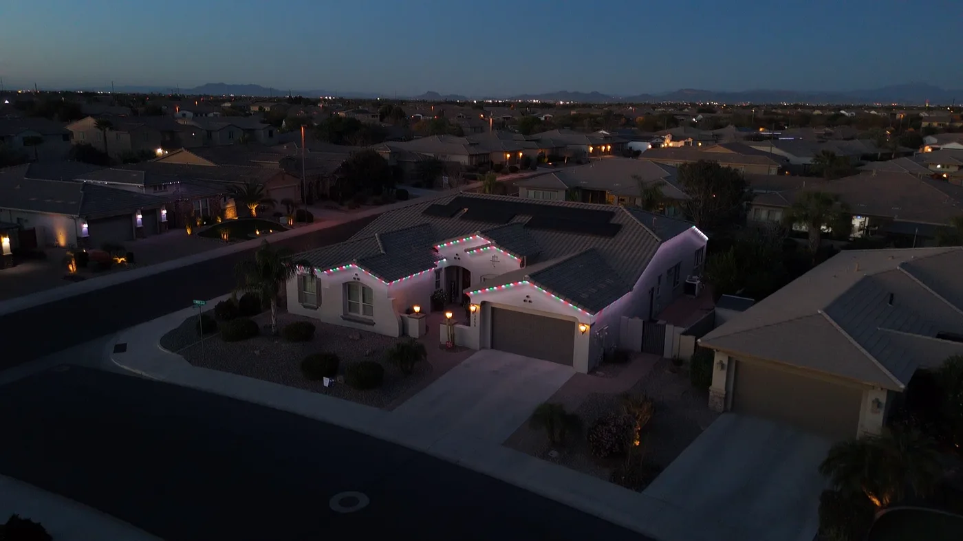 Multicolor roofline lighting at dusk